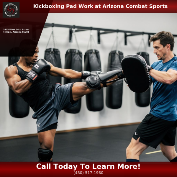 Adult student throwing a roundhouse kick on pads at Arizona Combat Sports kickboxing classes in Tempe AZ