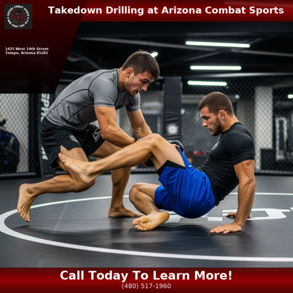 Two MMA fighters drilling a double-leg takedown on the mat at Arizona Combat Sports in Tempe, Arizona
