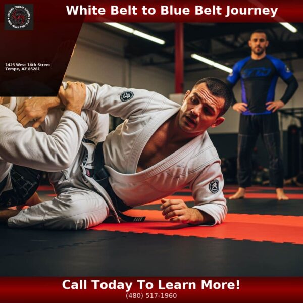 Adult BJJ student practicing escapes in a white gi during training at Arizona Combat Sports in Tempe, AZ